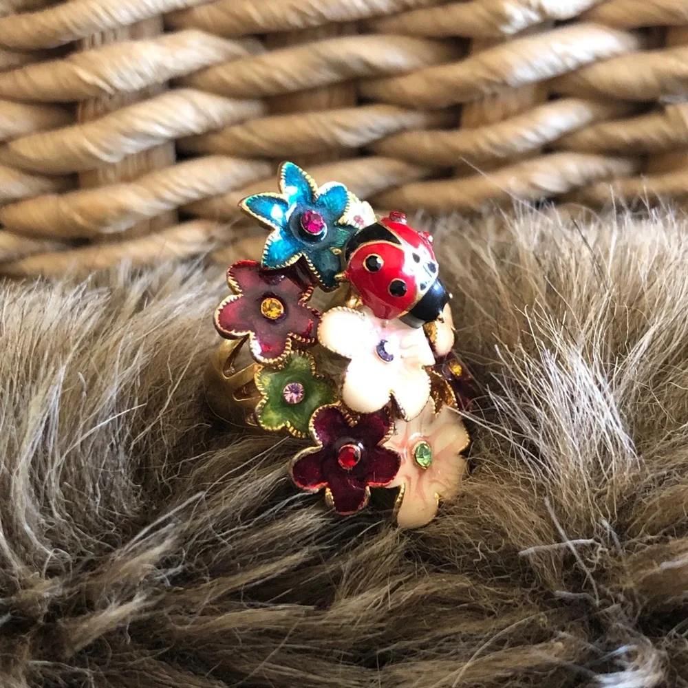 Aldo gold tone floral ladybug rhinestone ring